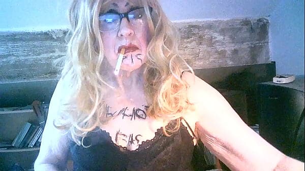 Filthy smoking pigslut Sarah humiliates herself by drinking own piss, wanking and penetrating her shit pipe cunt huge dildo